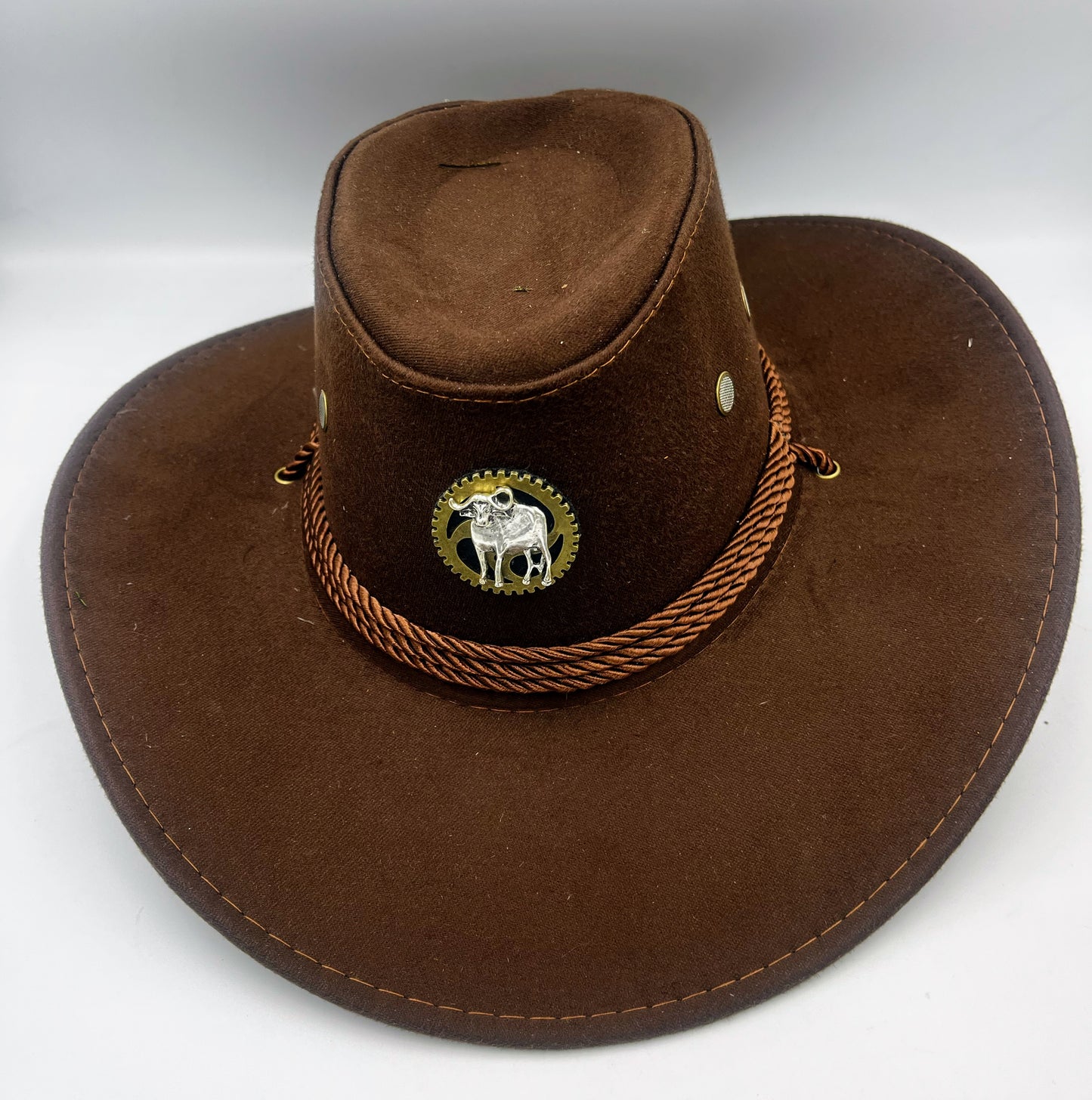 Brown cowboy hat, Steampunk Style with metal bull on large metal gear.