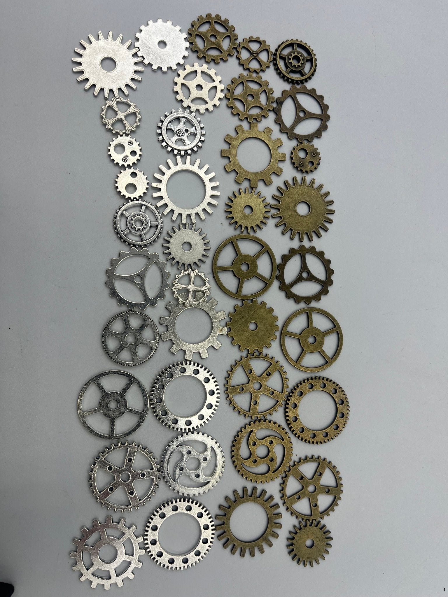 Steampunk silver metal gears for craft and jewellery purposes