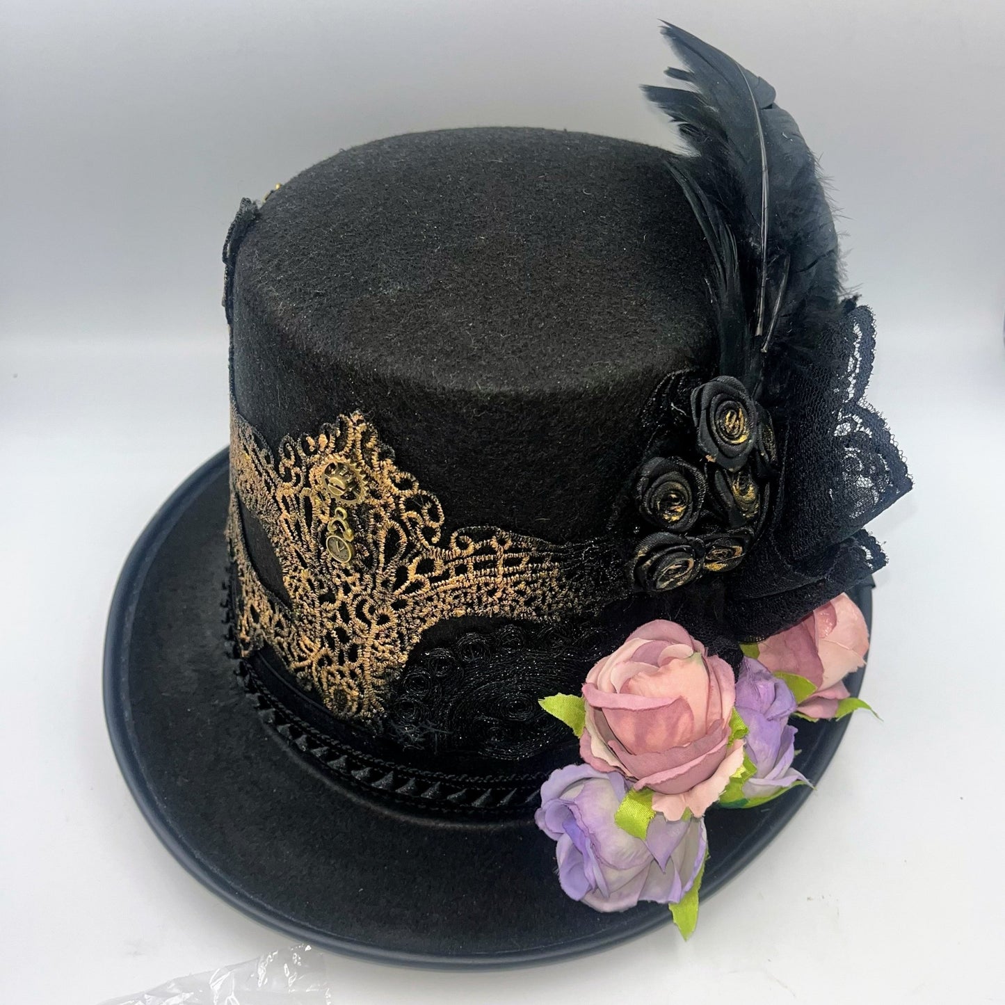 Victorian ladies Steampunk tophat in black with roses, feathers and lace mask attached. Premium product. -Steampunkgear