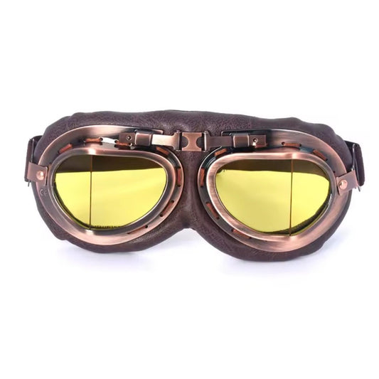 Front view of aviator goggles with yellow lenses, copper-coloured frames and brown padding.