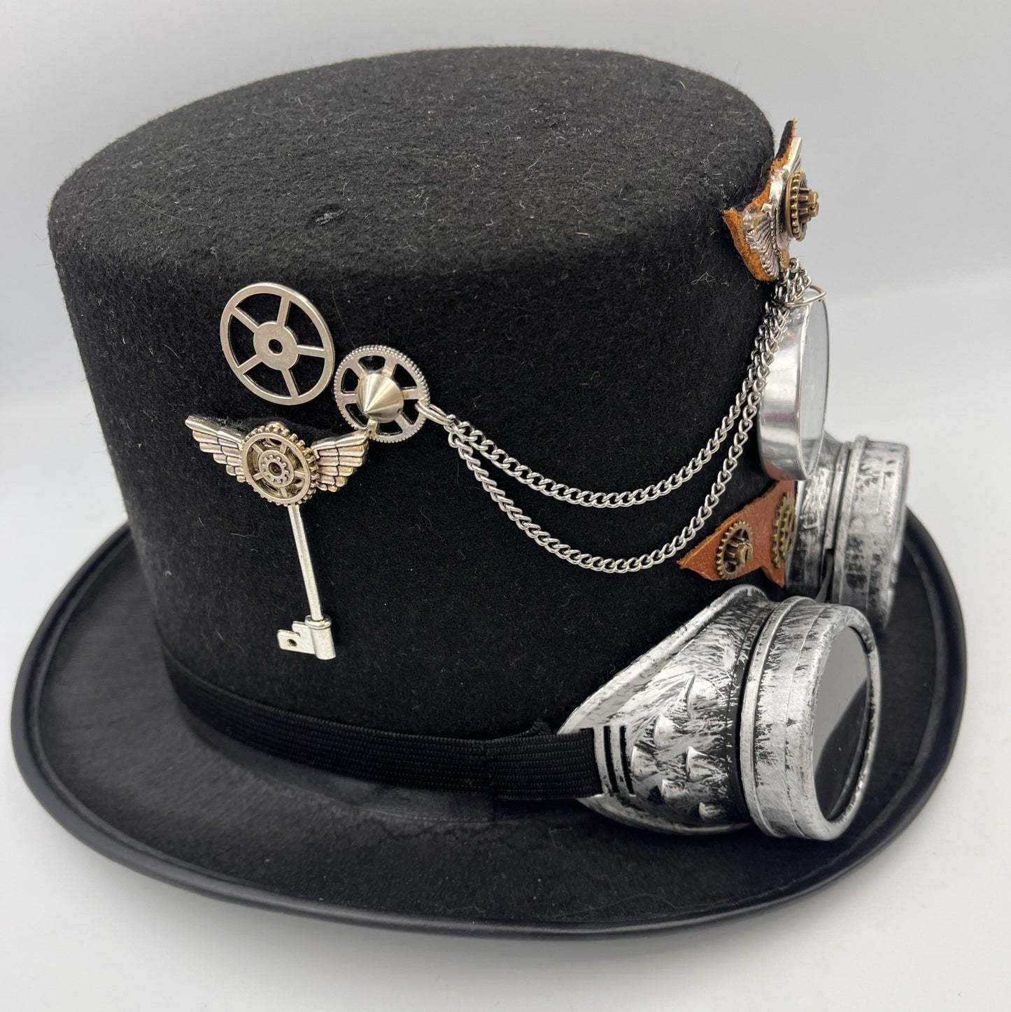 Steampunk tophat with compass, goggles and Steampunk charms